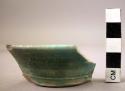 Pottery dish fragment - blue-green glaze