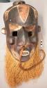 Ceremonial dance mask - wood with white and red paint; mustache of small animal