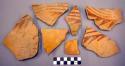 Sherds from decorated pottery bowl