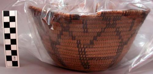 Basket with dark brown design