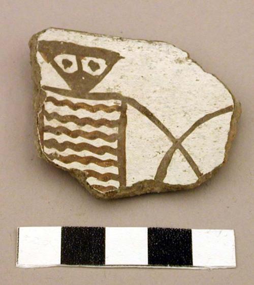 Ceramic sherds, black on white human figures, plain exterior