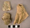5 fragments of pottery figurine bodies