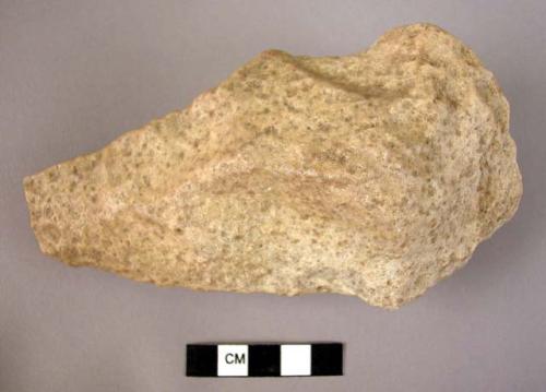 Pointed stone hand axe with thick butt