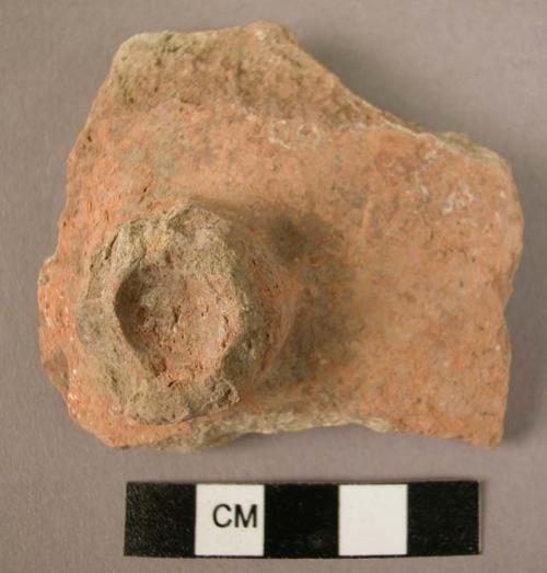 Potsherd - lug handle; brown slipped;