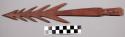 Carved wood spearpoint, triangular tip, barbed, flat butt end