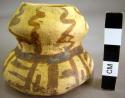 San Bernardo black-on-yellow pottery miniature jar