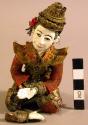 Kneeling pottery doll - painted and clothed