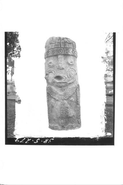 One large stone figure (front)