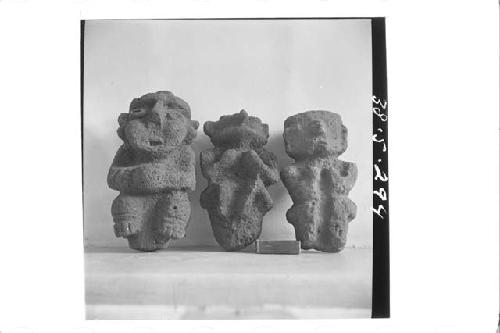 3 stone figurines (front)