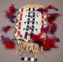 Woman's beaded deer skin trinket box with feather decoration