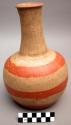 Long necked pottery vessel