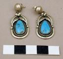 Earrings, silver pendant settings with turquoise stones