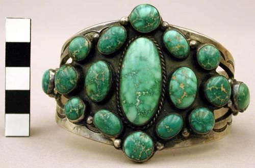 Cuff bracelet set with oval turquoise stones, stamped decoration