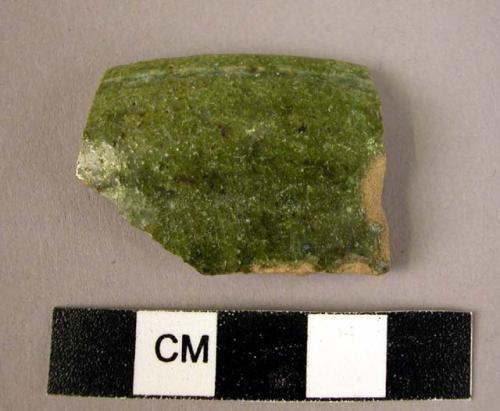 Rim potsherd - green glaze