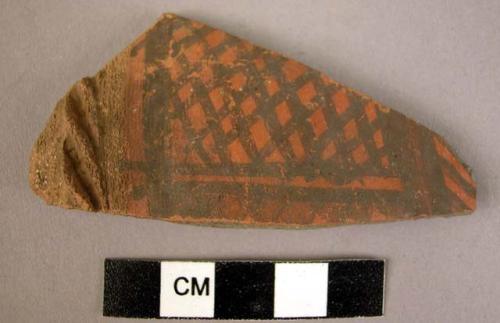 Potsherd - red painted and relief (B1)