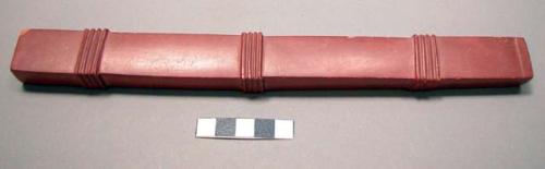 Pipe stem, rectangular, 3 bands of ridges, incised hand design, pointing