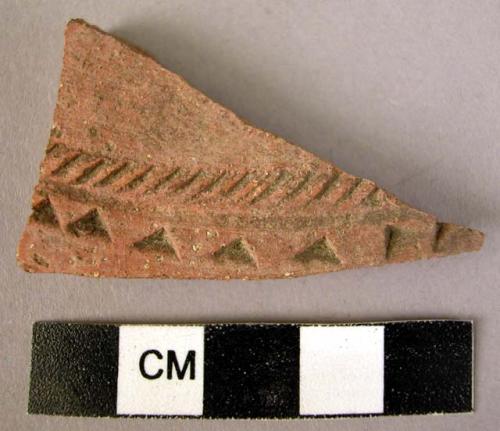 Potsherd - red-brown incised