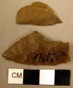 Fragments of 2 medium sized chipped stone implements