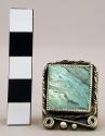 Silver ring w/ square turq. stone, frame-like setting w/ twisted wire border