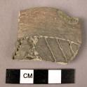 Rim potsherd - punctated, incised