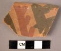 Ceramic rim sherd, buff ware with black and red painted design