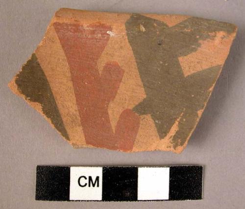 Ceramic rim sherd, buff ware with black and red painted design