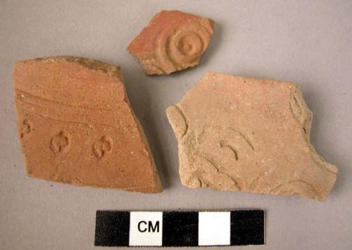 3 potsherds - red, stamped