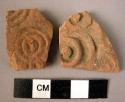 2 potsherds - red, stamped