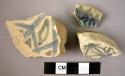 3 base potsherds - blue and black and white glaze