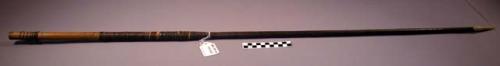 Spear, bone point, wood & reed shaft, wrapped with brown fiber