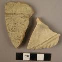 2 white slipped potsherds