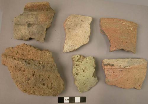 49 potsherds - coarse ware with slight incision