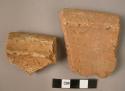 2 rim potsherds - plain ware