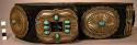 Leather belt with a stamped design around & between the conchas, a rectangular b