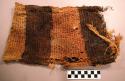 Fabric, loosely woven textile, brown & black dye, worn