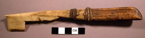 Bone net spacer, wooden handle