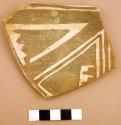 Ceramic sherd, rim, whiteware with black geometric design on interior