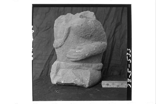 Small crude stone torso (Front & left side)