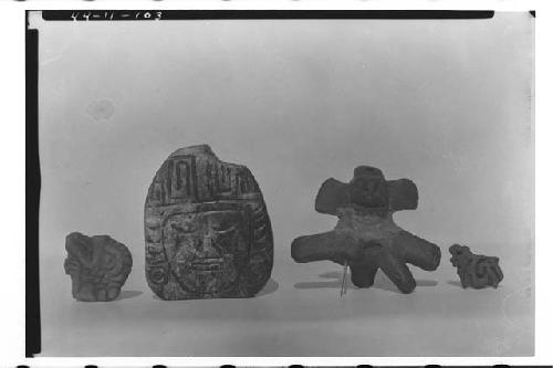From left to right: 1st on row, clay stamp.  2nd, Soap stone (?) large ring eith