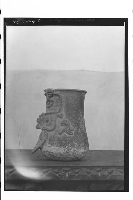 Side view of 44-15-46 [Vase with bearded face on front]