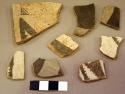 Black on white potsherds