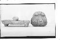 Mound B, Tomb V-metate and mano (Cat#B82) and stone head (Cat#B18)