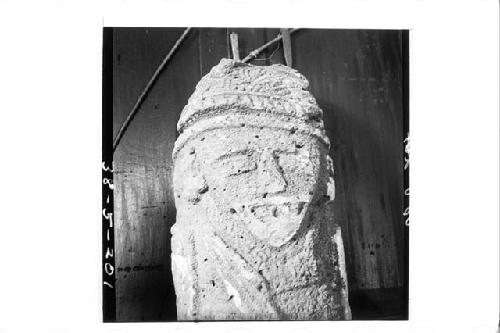 Face detail of large stone statue