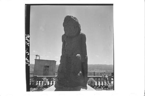 One large stone figure (front)