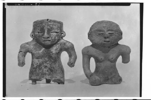 Clay figurines.  LEFT found in a grave - RIGHT found in a hole.