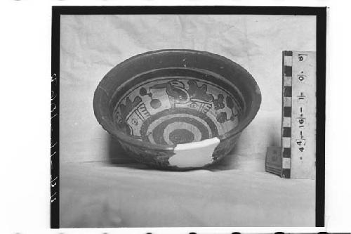 Double-curved, polychrome bowl