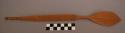 Spoon, carved wood, pointed, ridged ladle, perforated handle, incised design