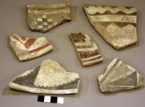 Ceramic rim and body sherds, black on white, red on white, geometric designs