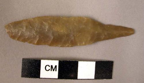 Flint elongated. bifacially pressure-flaked, leaf-shaped point