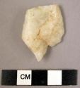 Quartz pointed flake - small, probably used as a perforator